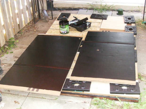 Black Liquid Rubber applied to cardboard walls of pool